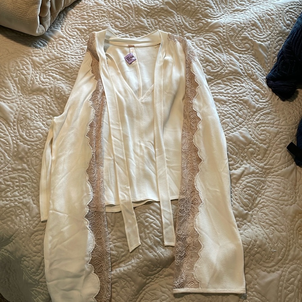 Free people top with lace arm detail